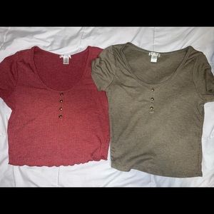 Two crop top shirts. both size large.